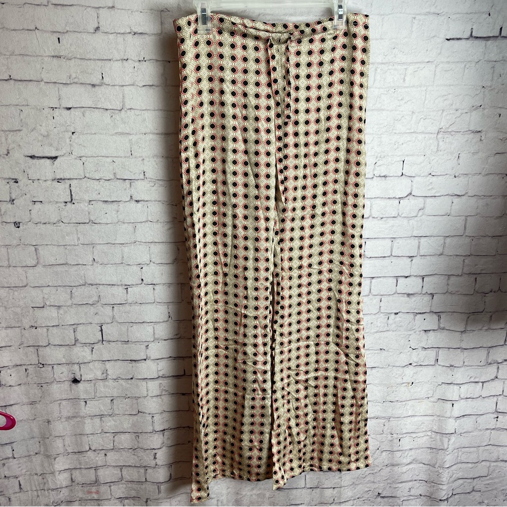 AUM apparel size small satin drawstring pants cream and black design